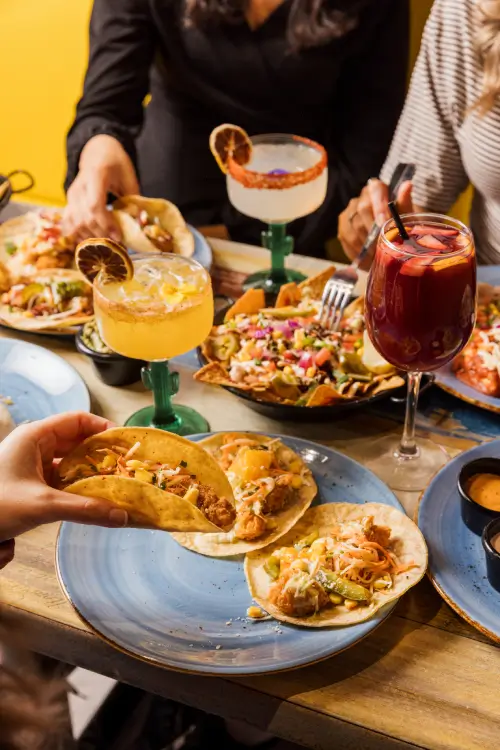 Friends enjoying Mexican food in Melbourne